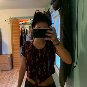 Patterned top with slits on shoulders